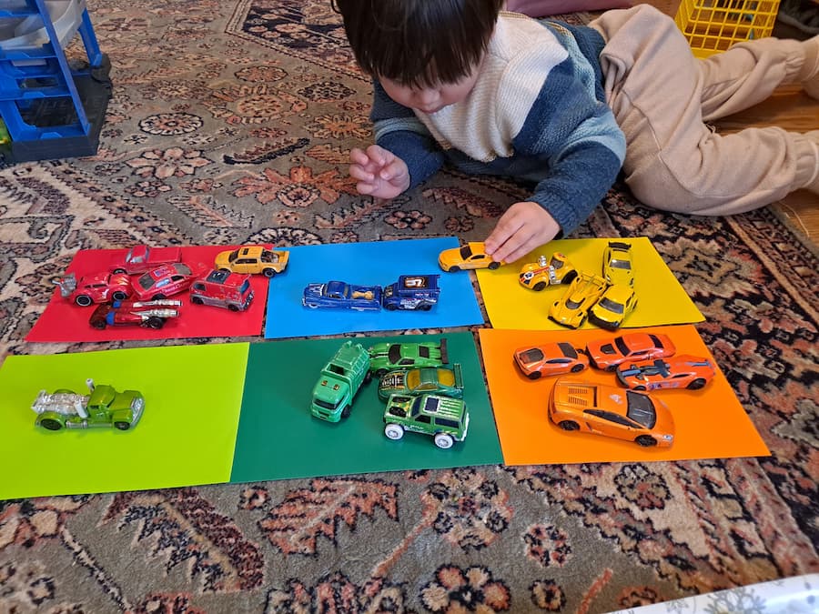 simple toy car sorting game is a fun and engaging way to help little kids learn colors while playing with their favorite toys