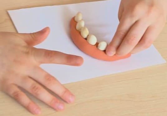 fun dental health preschool activity using playdough and beans