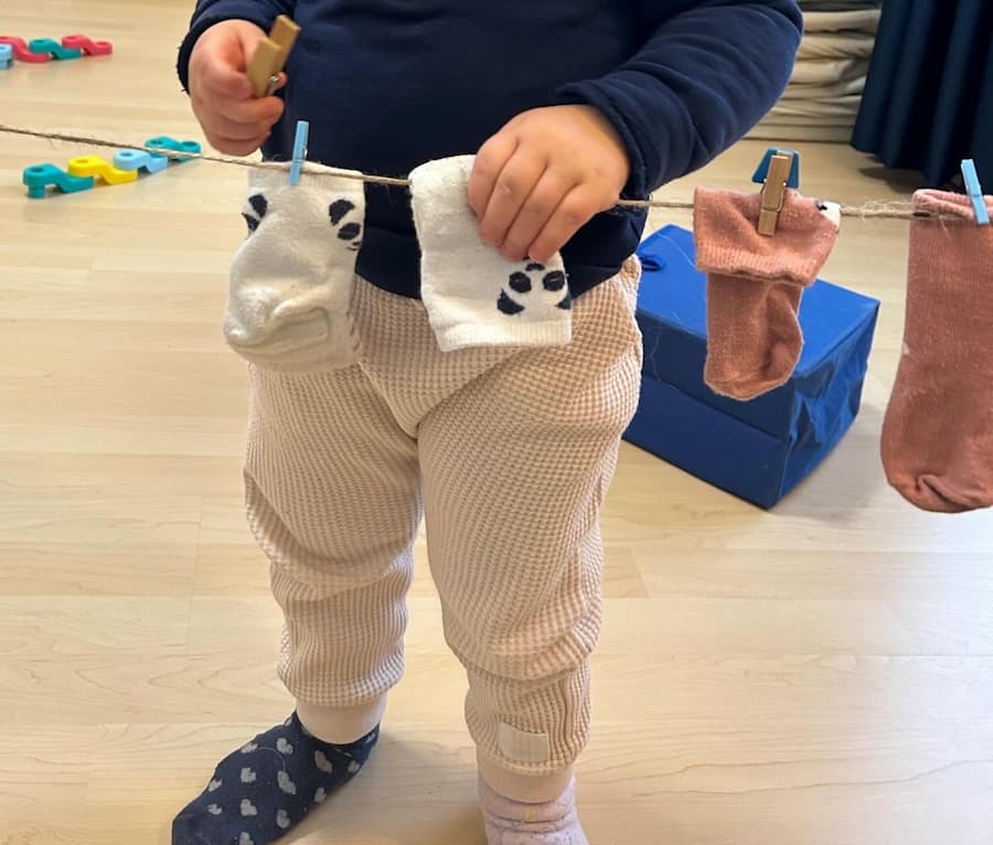 Easy Sock Hanging Activity for Toddlers