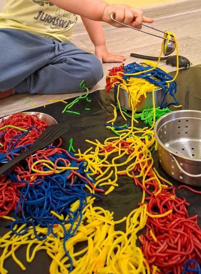 Colored Spaghetti Noodles Sensory Play: A Fun Toddler Activity That Turned Into Pretend Cooking Play