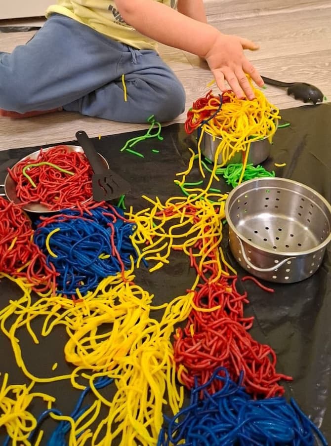 Colored Spaghetti Noodles Sensory Play: A Fun Toddler Activity That Turned Into Pretend Cooking Play